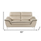 69" Beige And Silver Faux Leather Love Seat