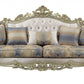 40" Antiqued White Velvet Curved Floral Sofa And Toss Pillows With Champagne Legs