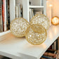 Set of Three Gold Aluminum Decorative Orbs