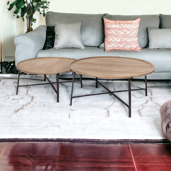 Set of Two 41 Brown And Black Solid Wood And Iron Round Nested Coffee Tables