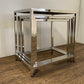 Set of Three 21" Silver And Brown Solid Wood Nested Tables