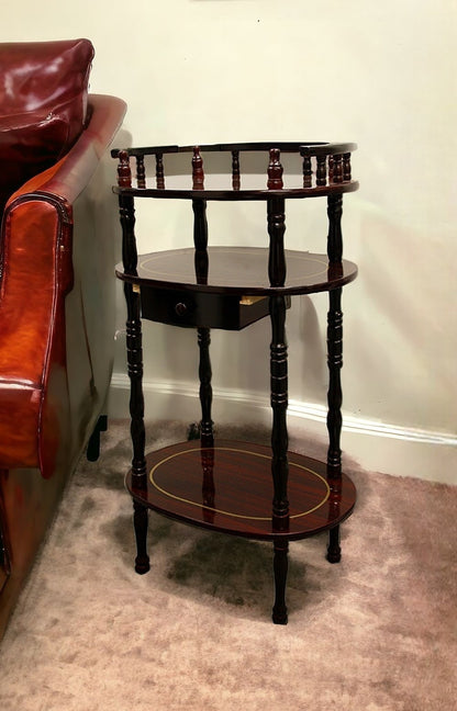 28" Brown Oval End Table With Drawer And Two Shelves