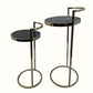 Set of Two 27" Gold And Black Stone Round Nested Tables