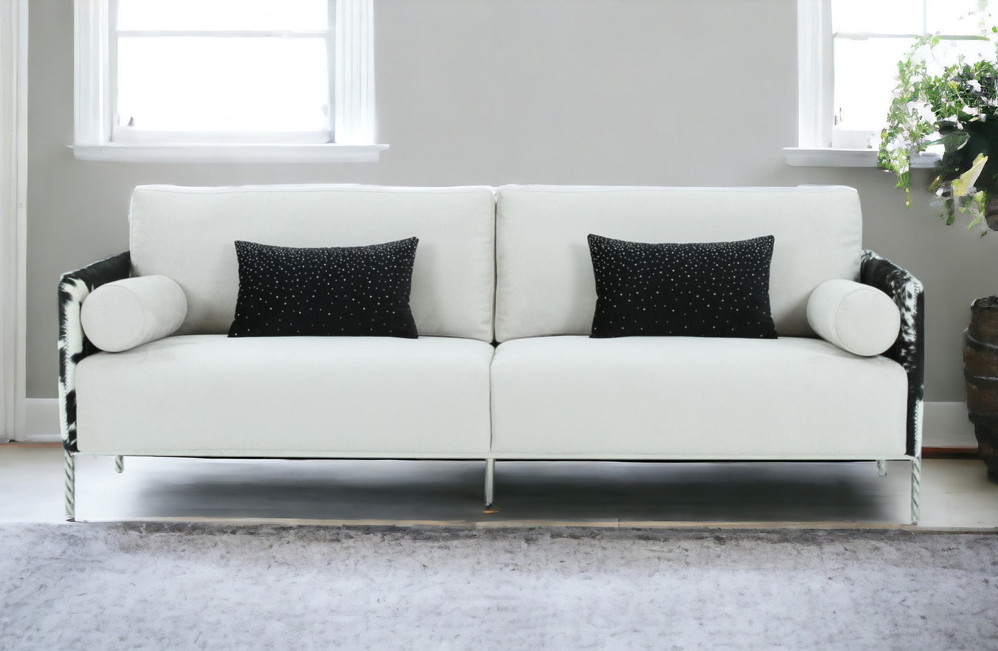 89" White Sofa And Toss Pillows With Silver Legs