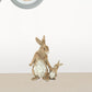 Set Of Two 7" Brown and White Polyresin Rabbit Figurine