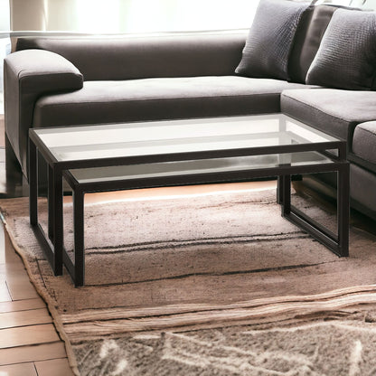 Set of Two 46" Black Glass And Steel Nested Coffee Tables