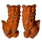 Set of Two Orange Ceramic Dog Sculptures