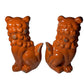 Set of Two Orange Ceramic Dog Sculptures