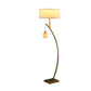 59" Matte Gold Dual Arc Floor Lamp With White Drum Shade
