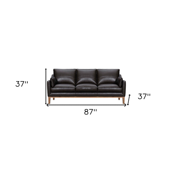 87 Dark Brown Leather Sofa And Toss Pillows With Brown Legs