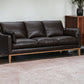 87" Dark Brown Leather Sofa And Toss Pillows With Brown Legs