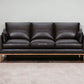 87" Dark Brown Leather Sofa And Toss Pillows With Brown Legs