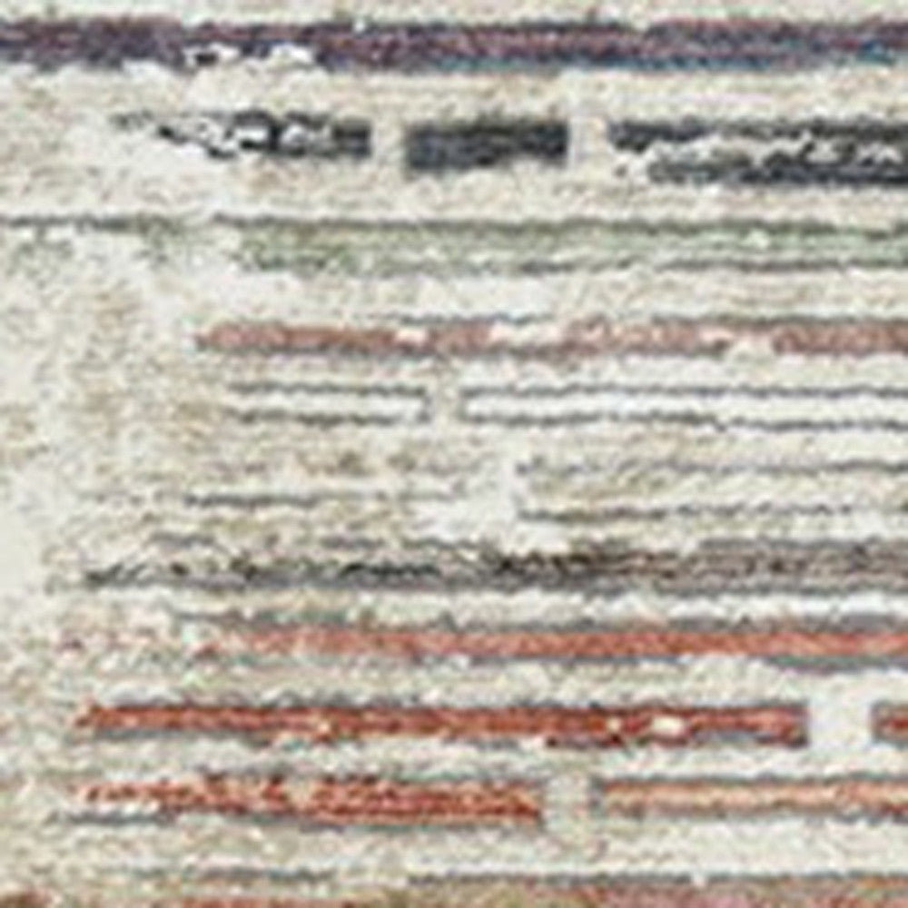 2' x 3' Beige Geometric Distressed Area Rug With Fringe