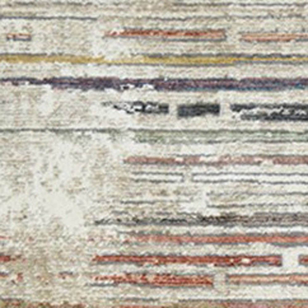 2' x 3' Beige Geometric Distressed Area Rug With Fringe