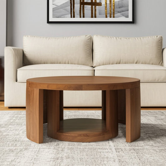 Wooden coffee table in front of a beige sofa with a framed picture on the wall.