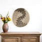 12" X 12" Brown Black And White Round Geo Seagrass Hanging Dimensional Sculpture